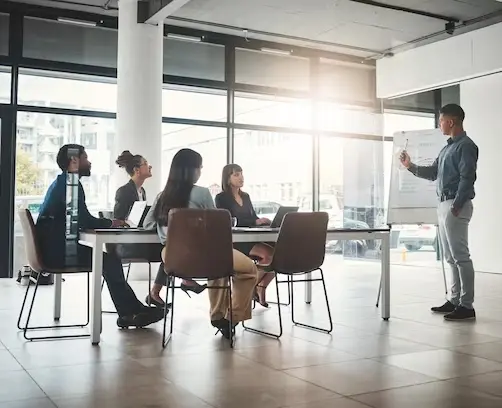 businessman-coaching-whiteboard-presentation-leadership-office-conference-workshop-male-leader-coach-mentor-speaking-staff-training-marketing-planning-corporate-strategy_590464-149984.jpg copy